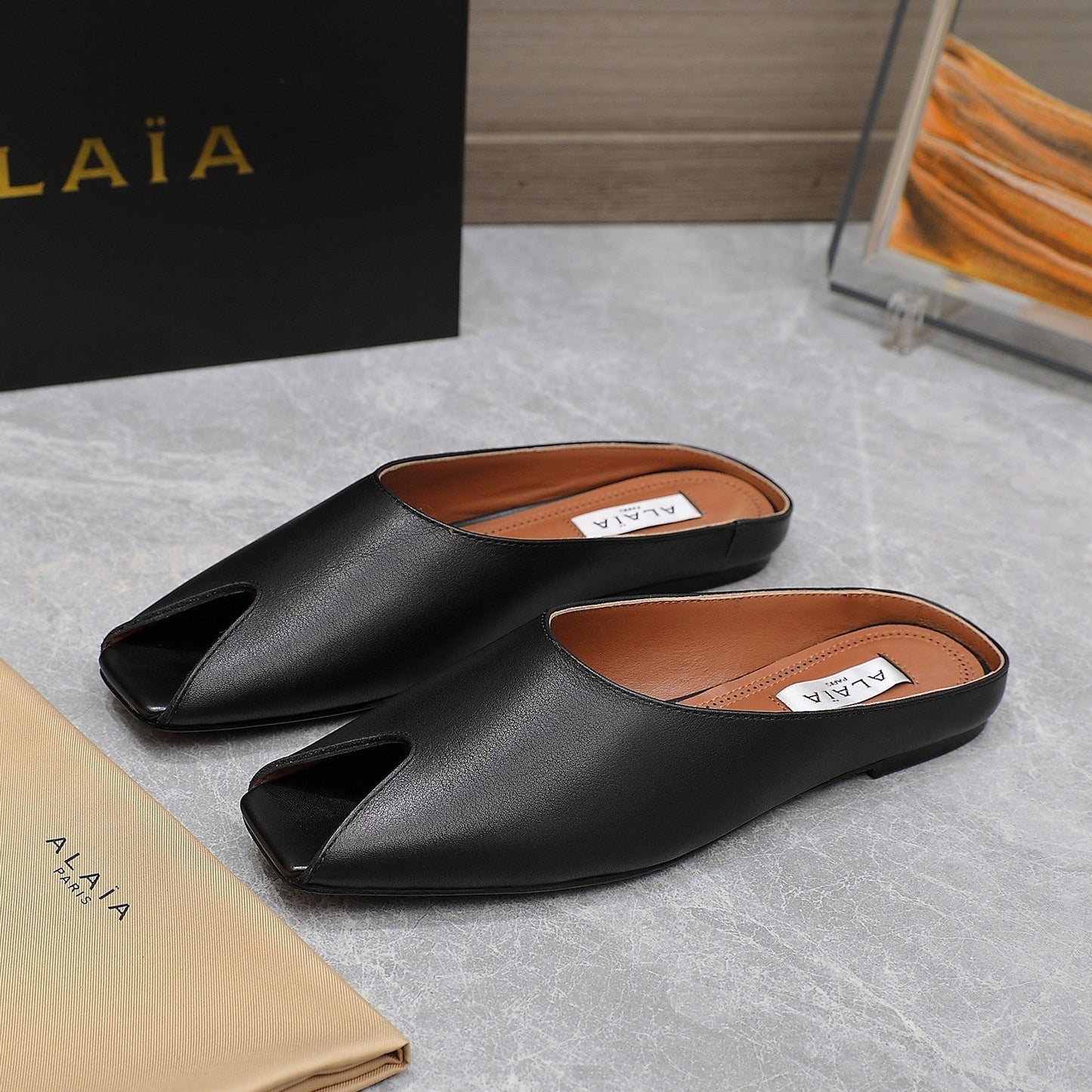 ALAIA FLAT MULE IN BLACK LAMBSKIN - 34