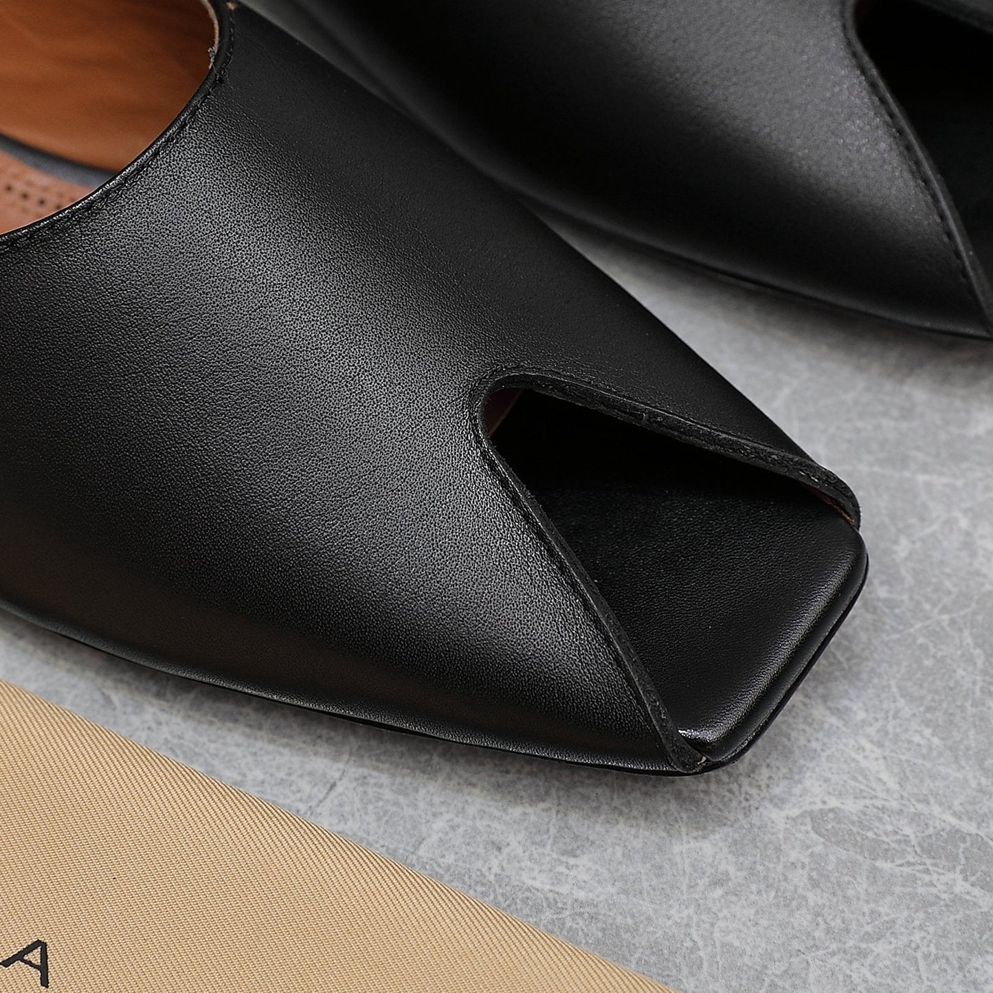 ALAIA FLAT MULE IN BLACK LAMBSKIN - 34