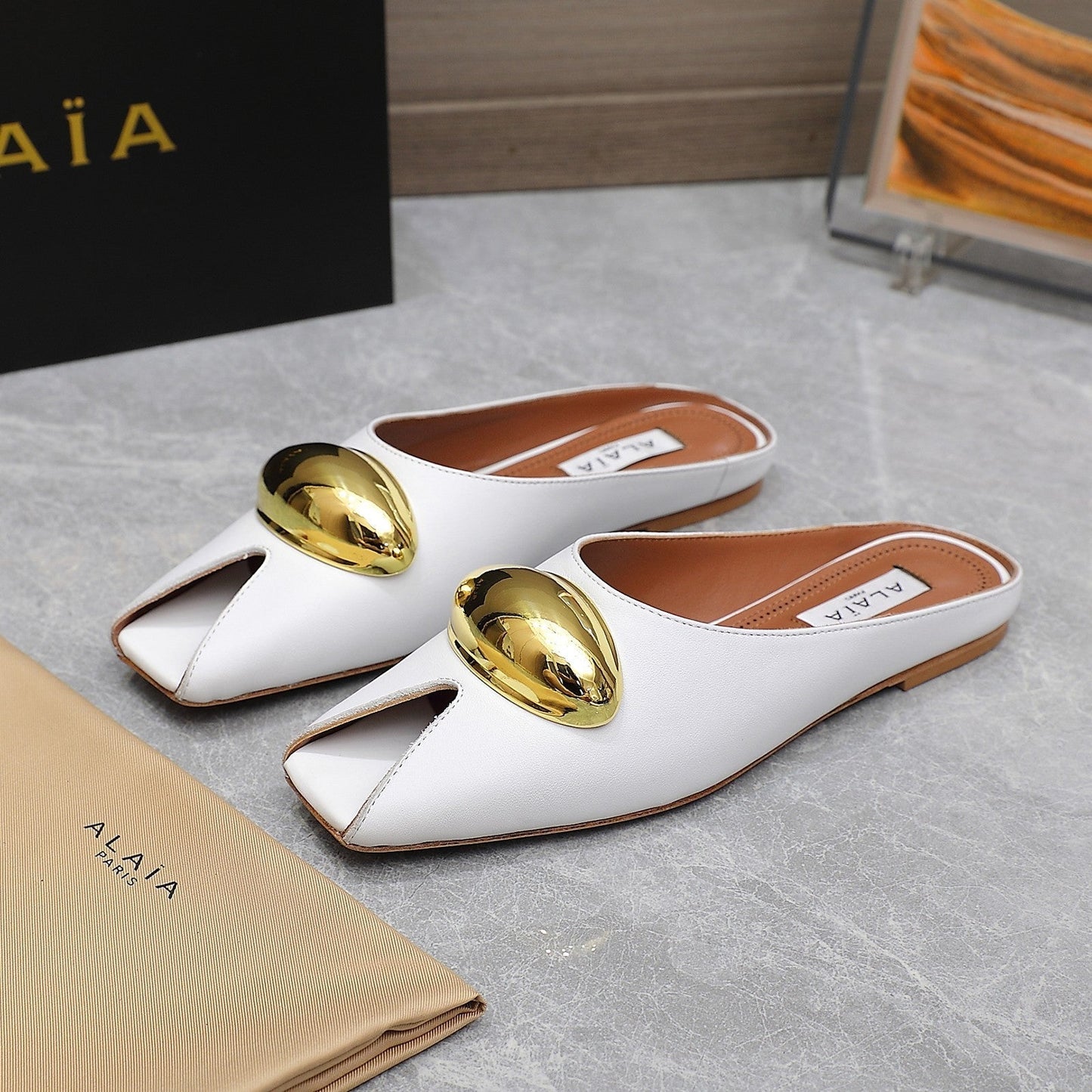 ALAIA FLAT MULE IN WHITE LAMBSKIN WITH GOLD HARDWARE - 34