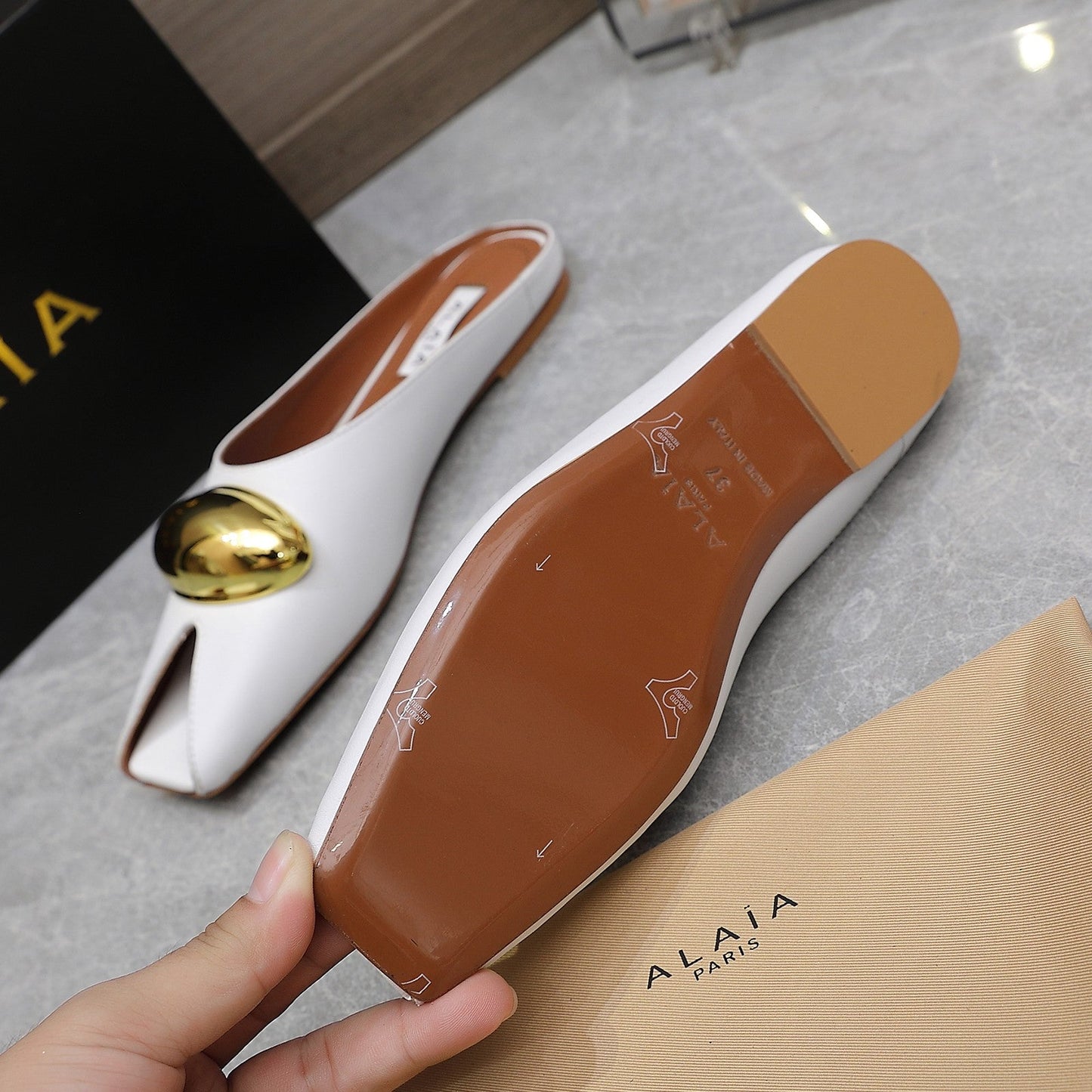 ALAIA FLAT MULE IN WHITE LAMBSKIN WITH GOLD HARDWARE - 34