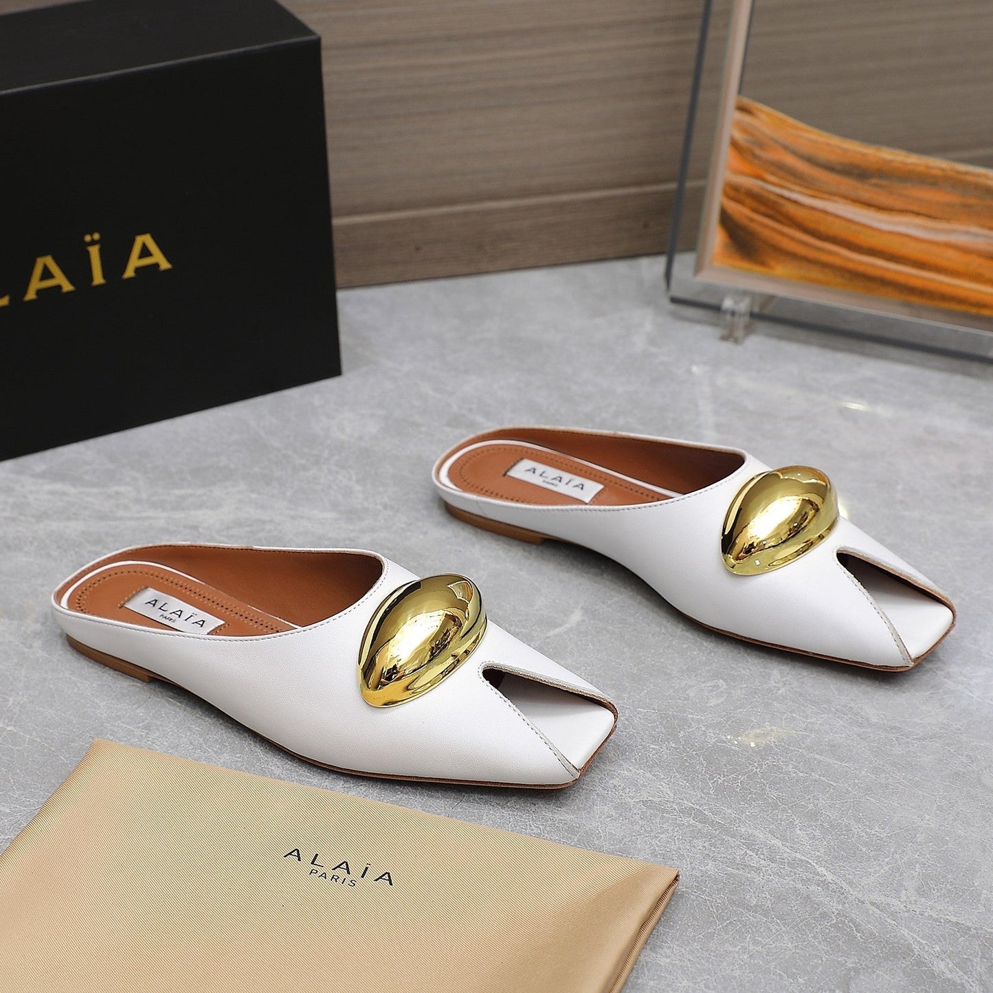 ALAIA FLAT MULE IN WHITE LAMBSKIN WITH GOLD HARDWARE - 34