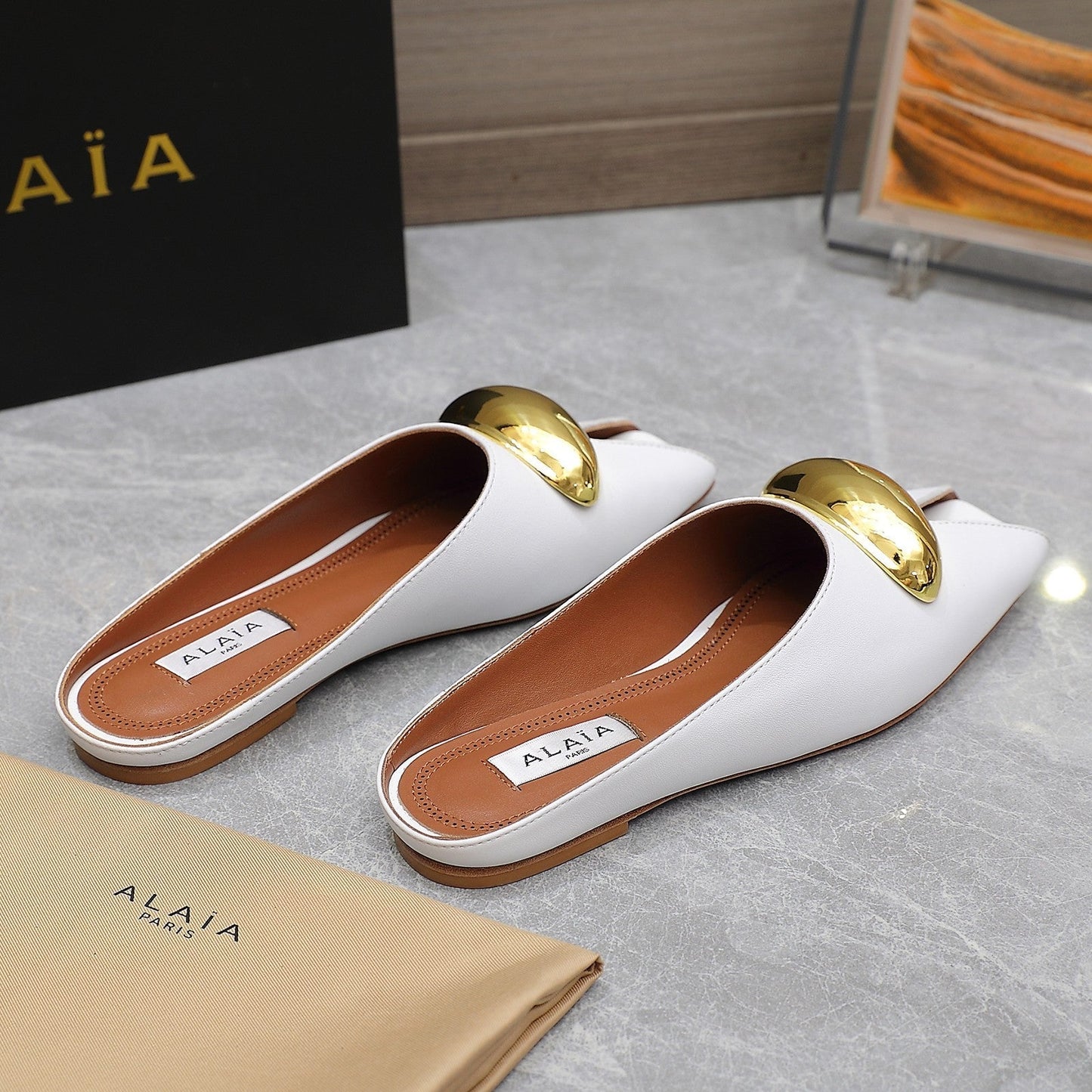 ALAIA FLAT MULE IN WHITE LAMBSKIN WITH GOLD HARDWARE - 34