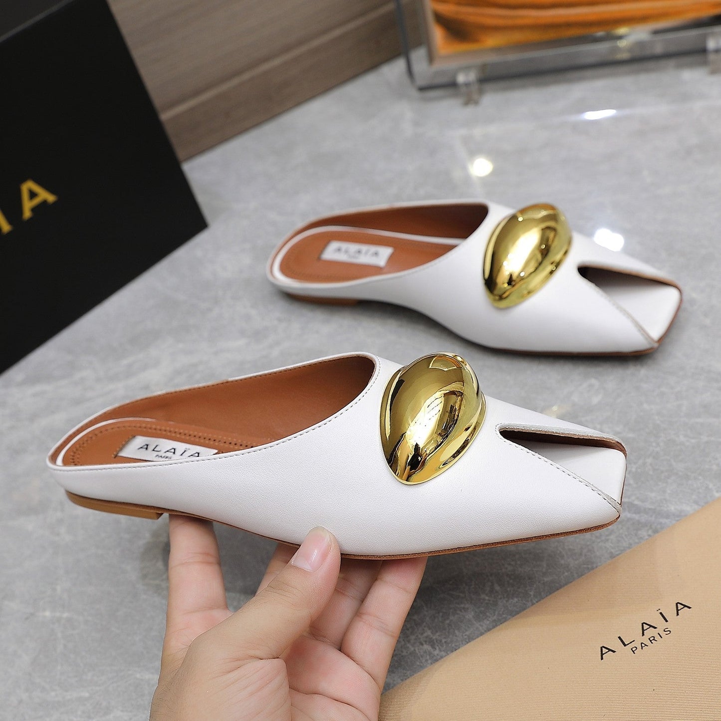 ALAIA FLAT MULE IN WHITE LAMBSKIN WITH GOLD HARDWARE - 34