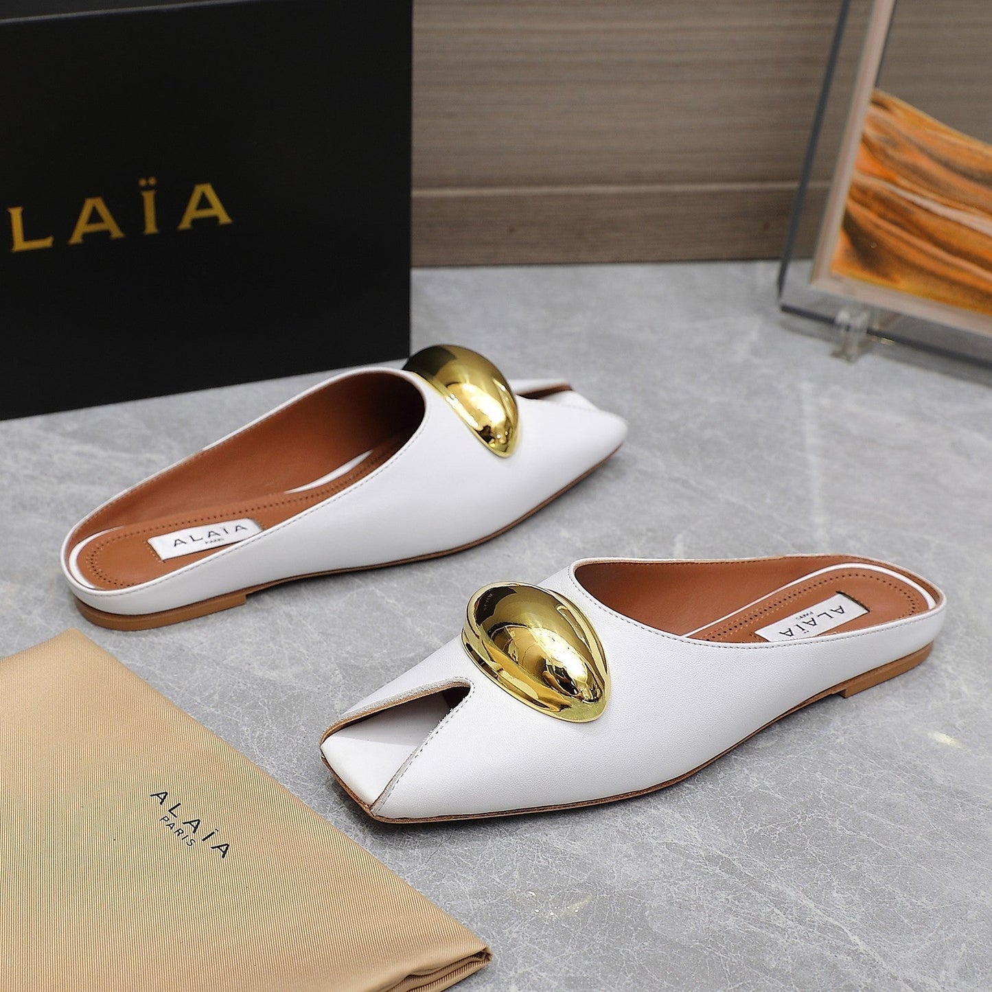 ALAIA FLAT MULE IN WHITE LAMBSKIN WITH GOLD HARDWARE - 34
