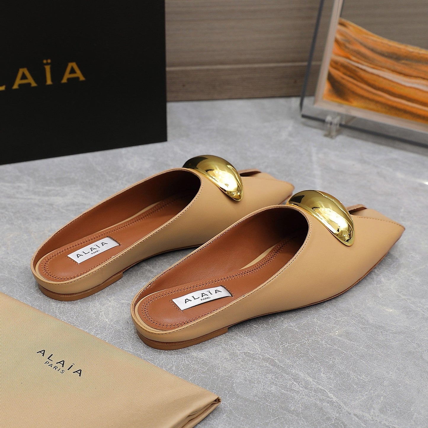 ALAIA FLAT MULE IN SEPIA TAN LAMBSKIN WITH GOLD HARDWARE - 34