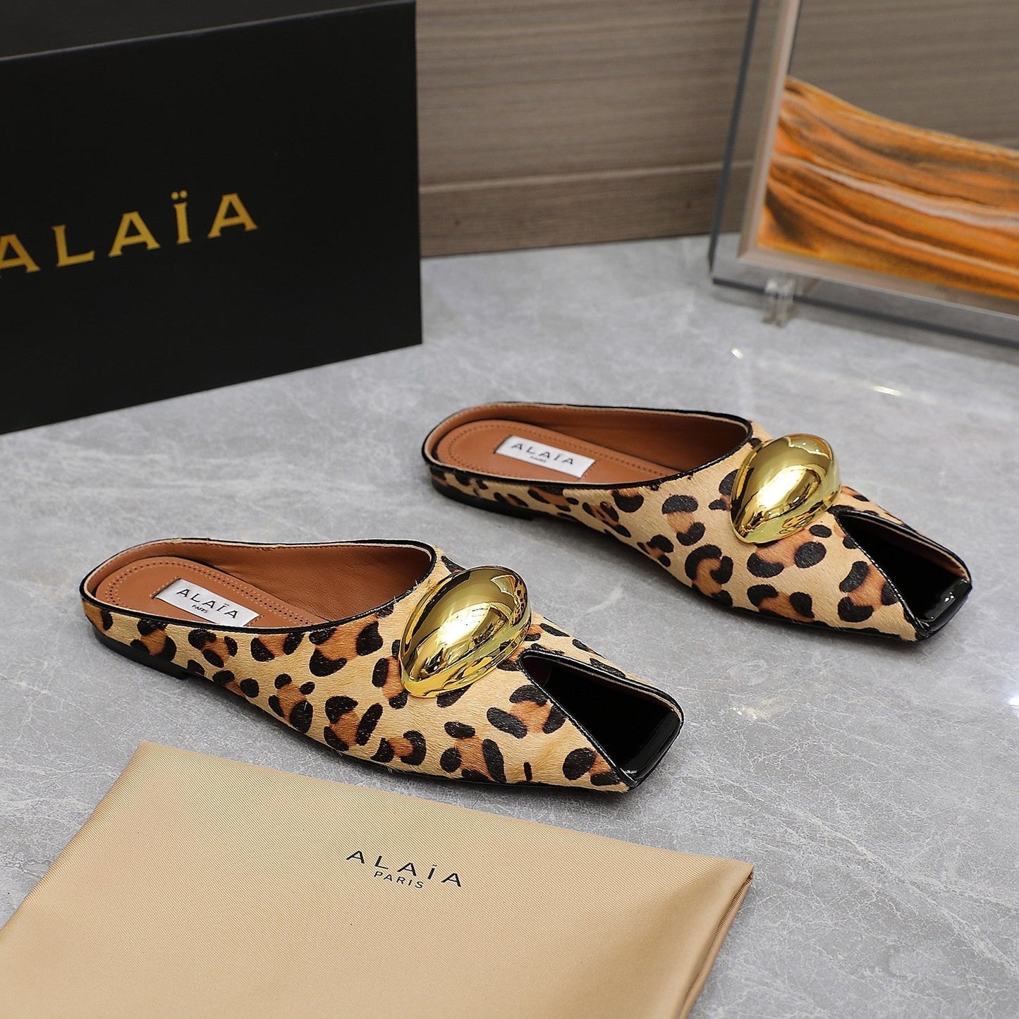 ALAIA FLAT MULE IN LEOPARD LAMBSKIN WITH GOLD HARDWARE - 34