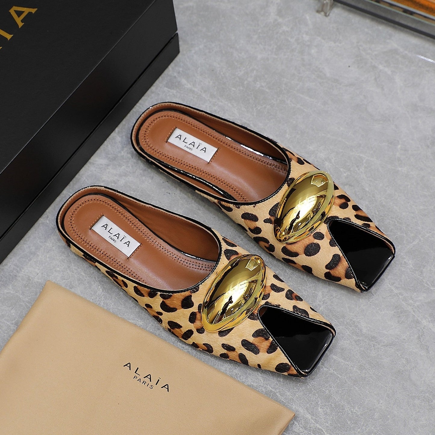 ALAIA FLAT MULE IN LEOPARD LAMBSKIN WITH GOLD HARDWARE - 34