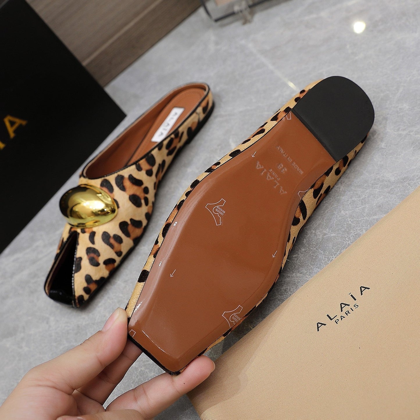 ALAIA FLAT MULE IN LEOPARD LAMBSKIN WITH GOLD HARDWARE - 34