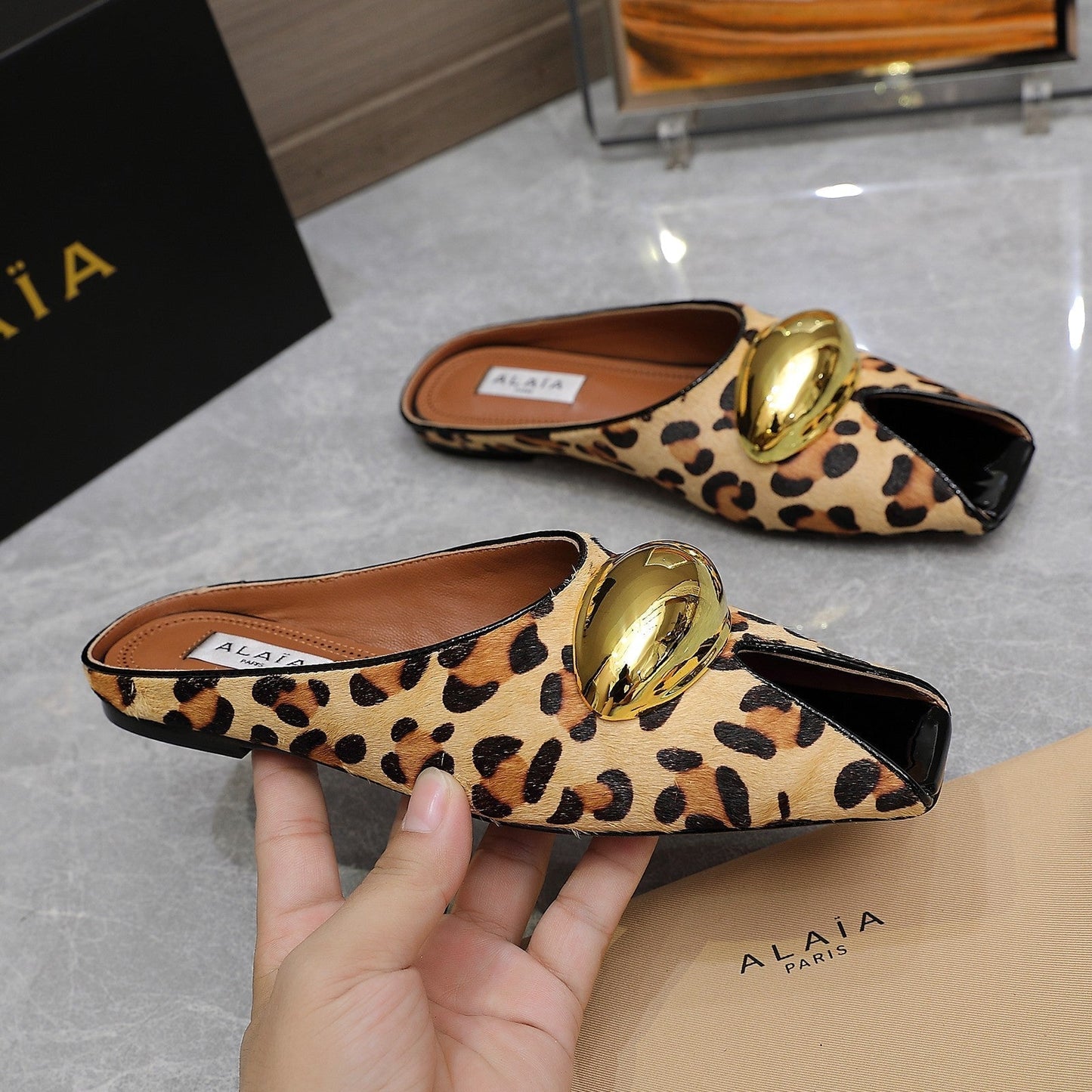 ALAIA FLAT MULE IN LEOPARD LAMBSKIN WITH GOLD HARDWARE - 34