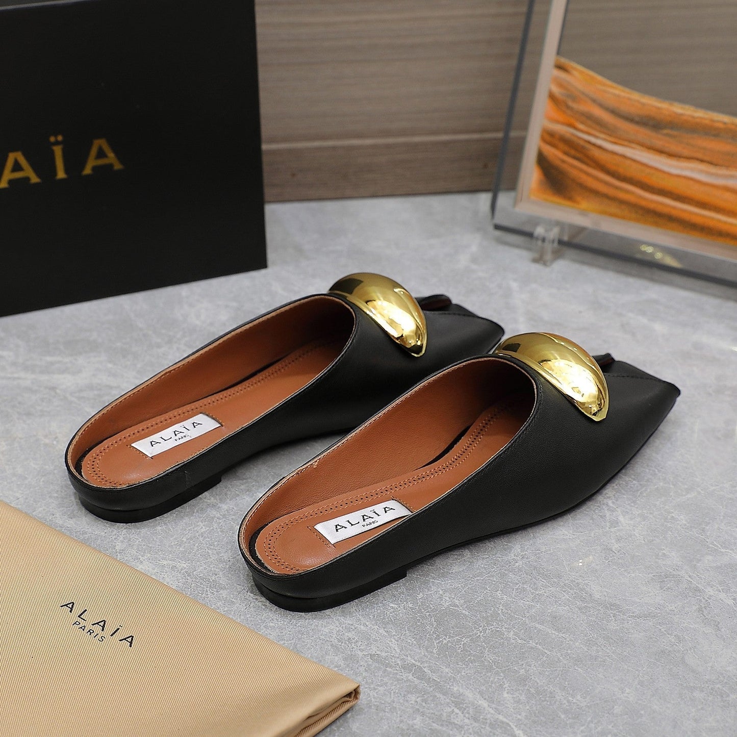 ALAIA FLAT MULE IN BLACK LAMBSKIN WITH GOLD HARDWARE - 34
