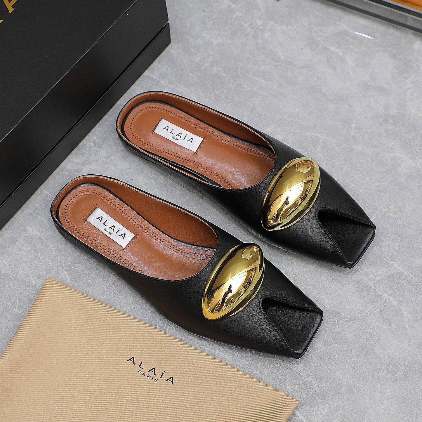 ALAIA FLAT MULE IN BLACK LAMBSKIN WITH GOLD HARDWARE - 34