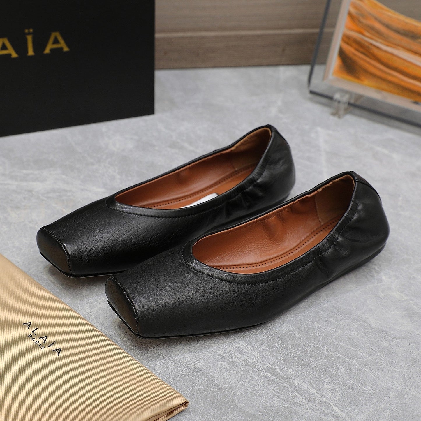 ALAIA BALLET FLATS IN BLACK SMOOTH CALFSKIN - 35