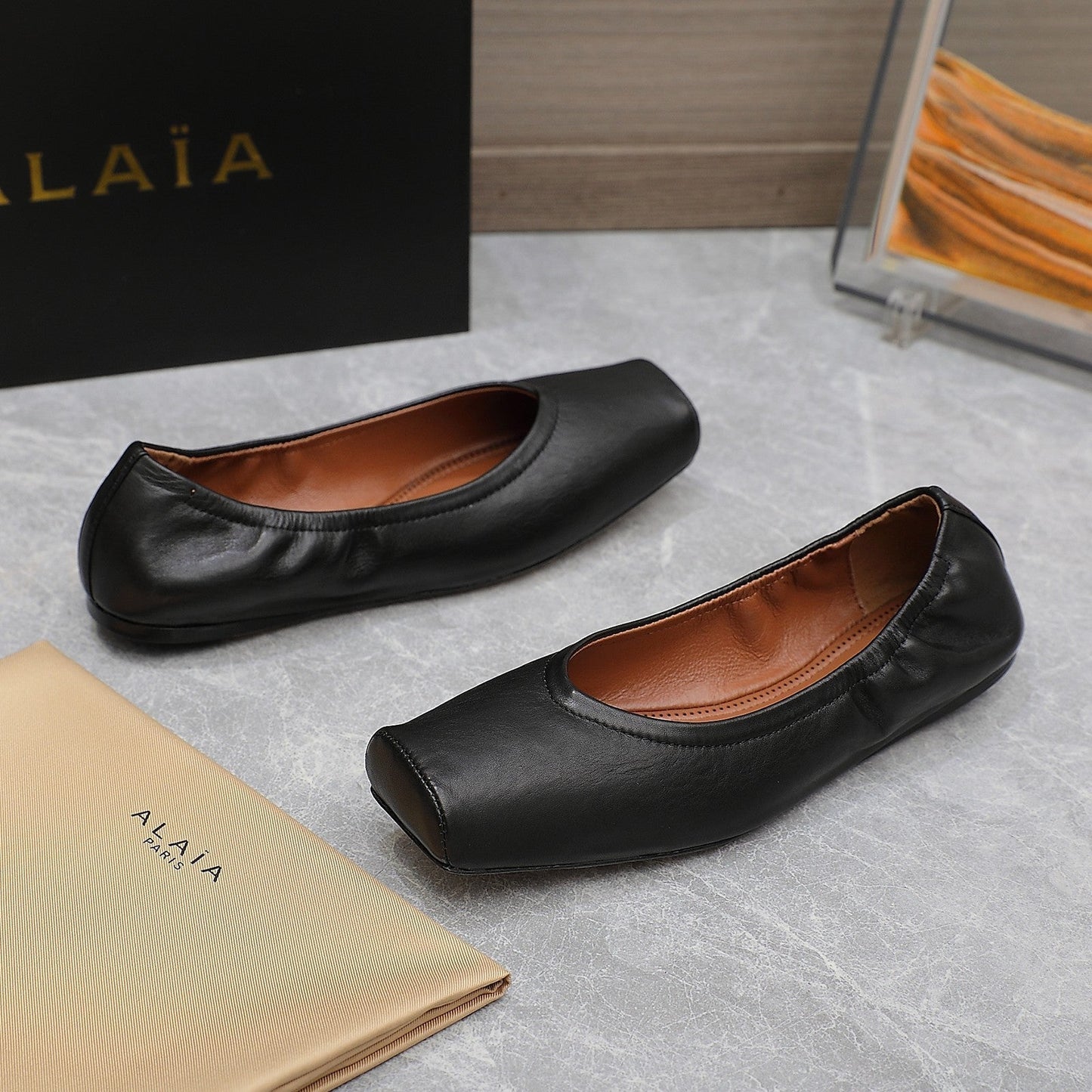 ALAIA BALLET FLATS IN BLACK SMOOTH CALFSKIN - 35