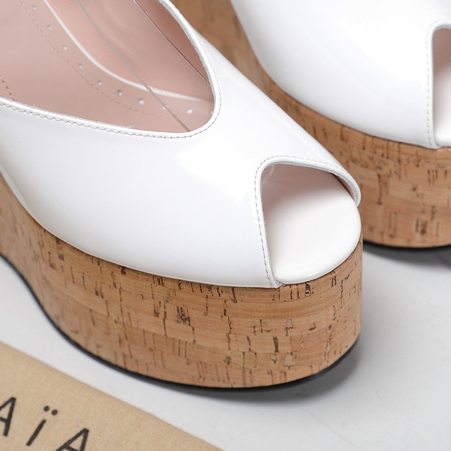 ALAIA WEDGE SANDAL IN WHITE GLOSSY CALFSKIN AND BEIGE RUBBER - 35