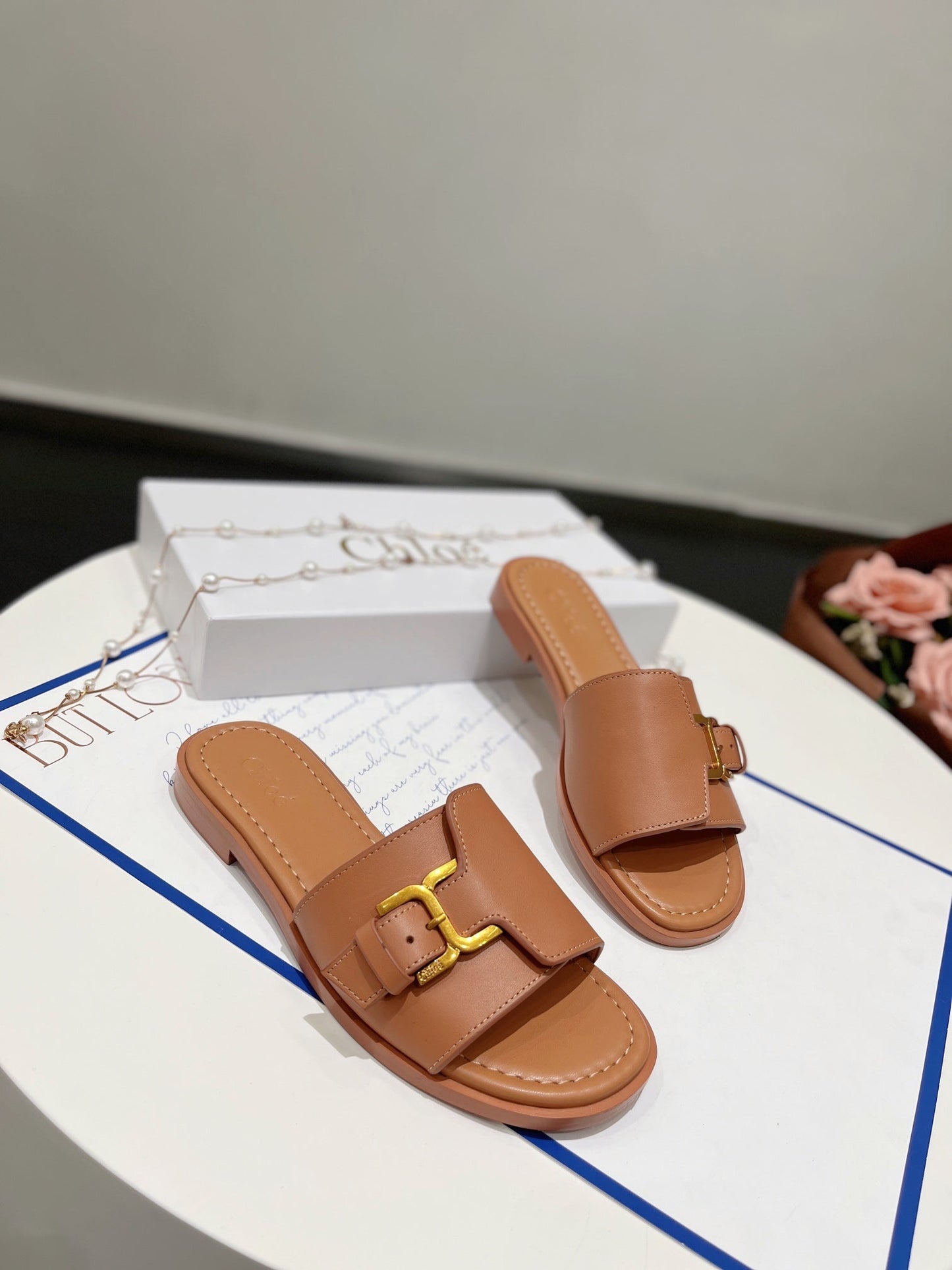 MARCIE SLIDE IN BRONZE BROWN CALFSKIN WITH GOLD HARDWARE - 35