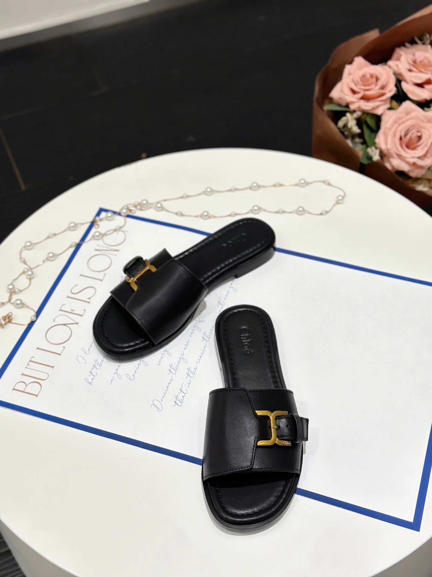 MARCIE SLIDE IN BLACK CALFSKIN WITH GOLD HARDWARE - 35