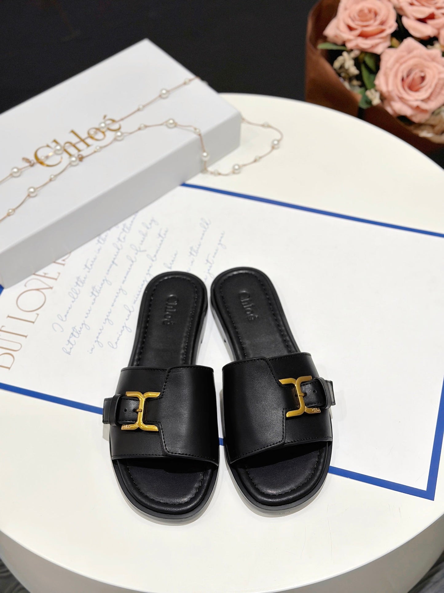 MARCIE SLIDE IN BLACK CALFSKIN WITH GOLD HARDWARE - 35