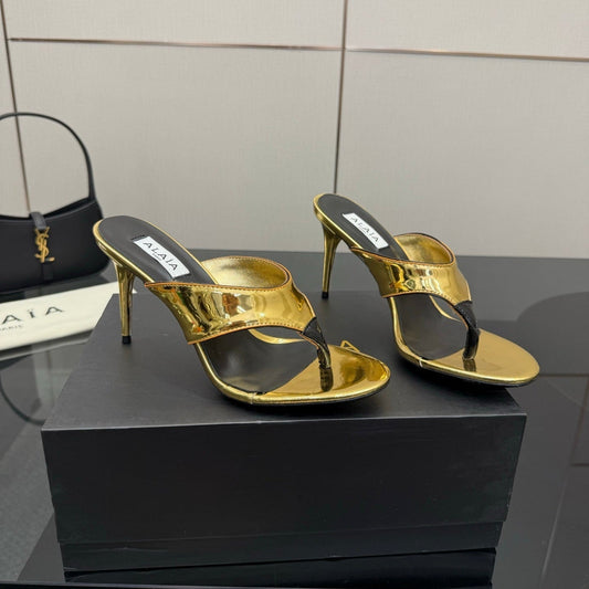 ALAIA HEELED THONG 25S IN GOLD PATENT LEATHER - 35