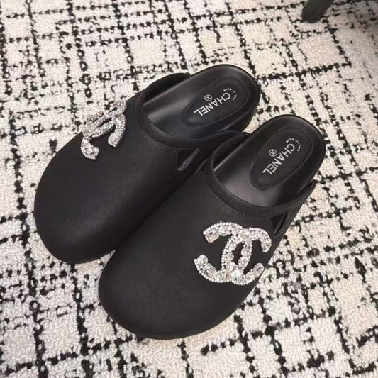 FLAT MULES IN BLACK CALFSKIN - 35