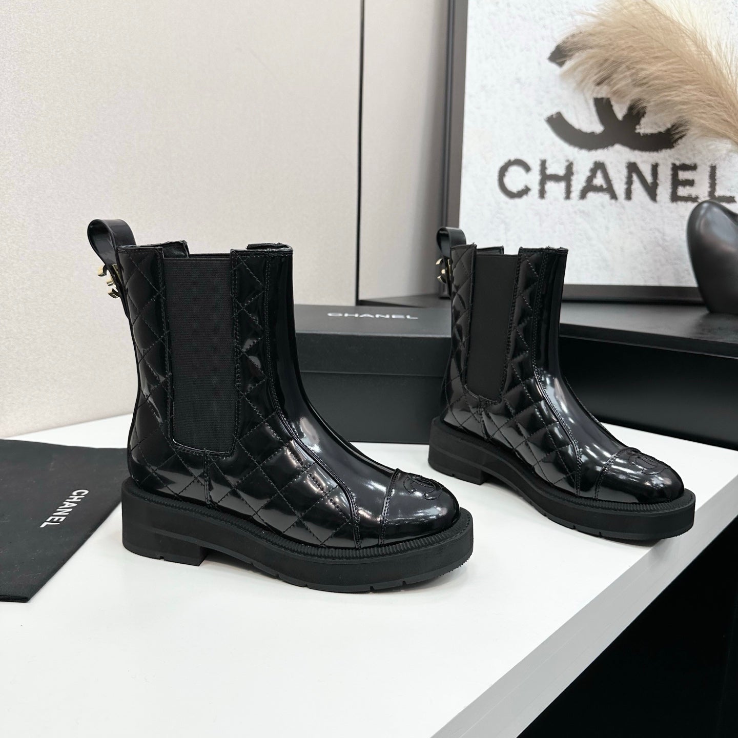 CHANEL 25S ELASTIC CHELSEA BOOTS IN BLACK GLOSSY CALFSKIN - 35