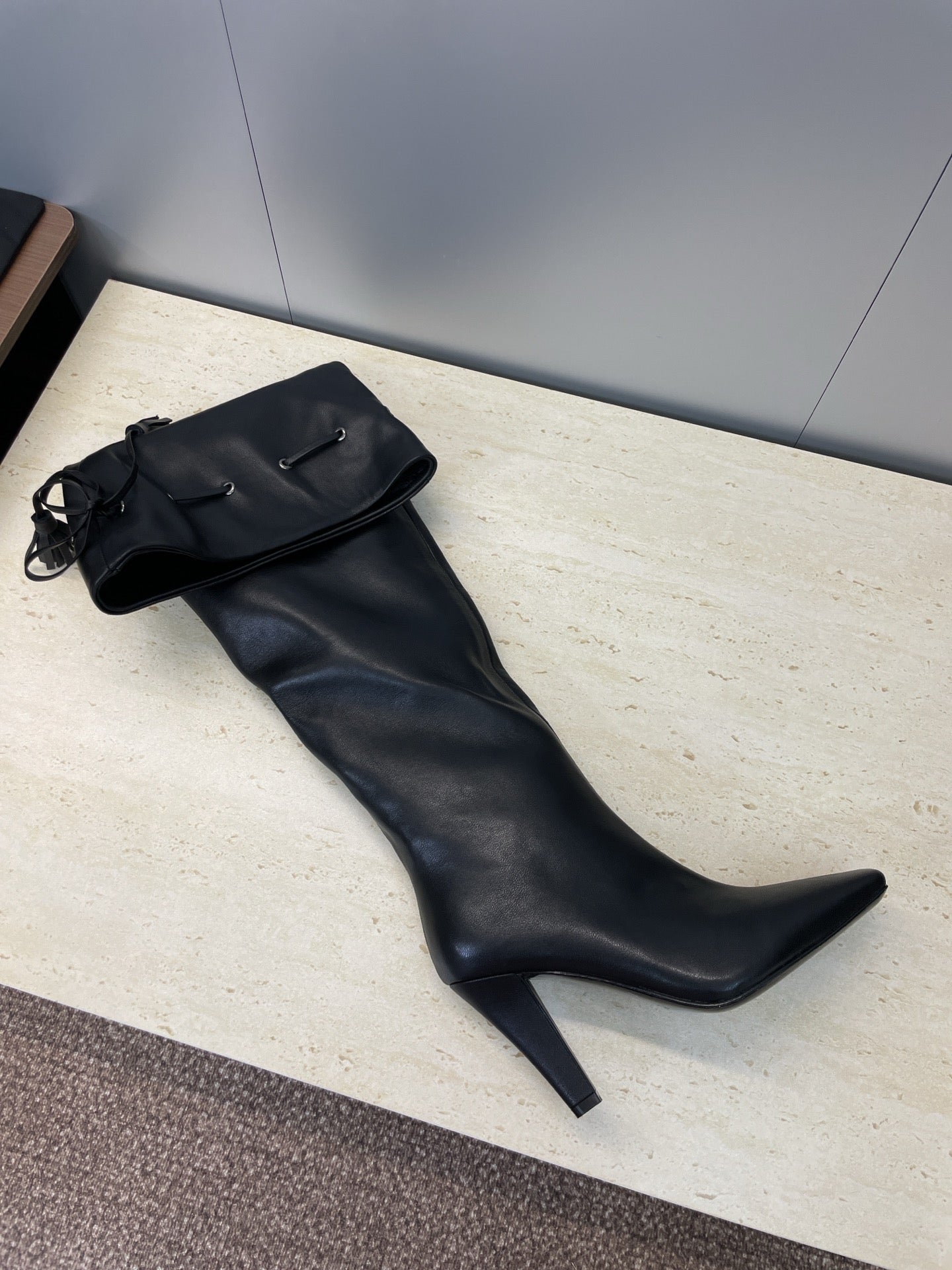 YSL 25S HIGH‑HEEL FRINGED MARTIN BOOTS 90 MM IN BLACK LAMBSKIN - 35