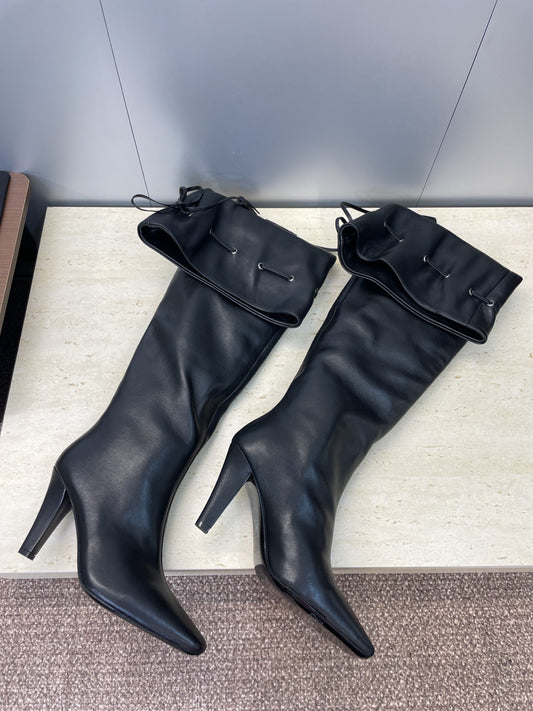 YSL 25S HIGH‑HEEL FRINGED MARTIN BOOTS 90 MM IN BLACK LAMBSKIN - 35