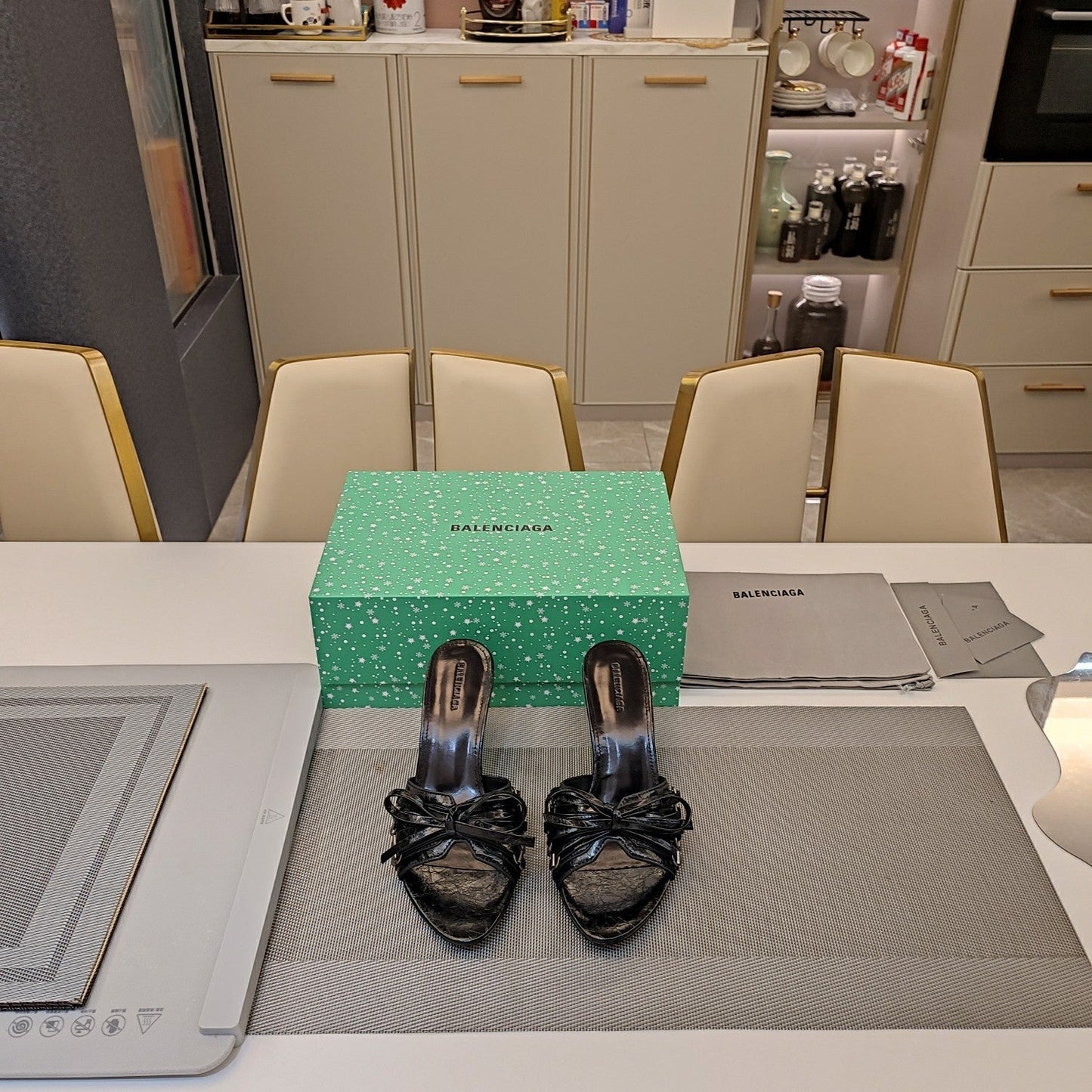 BOW-EMBELLISHED HIGH MULES IN BLACK SHEEPSKIN - 34