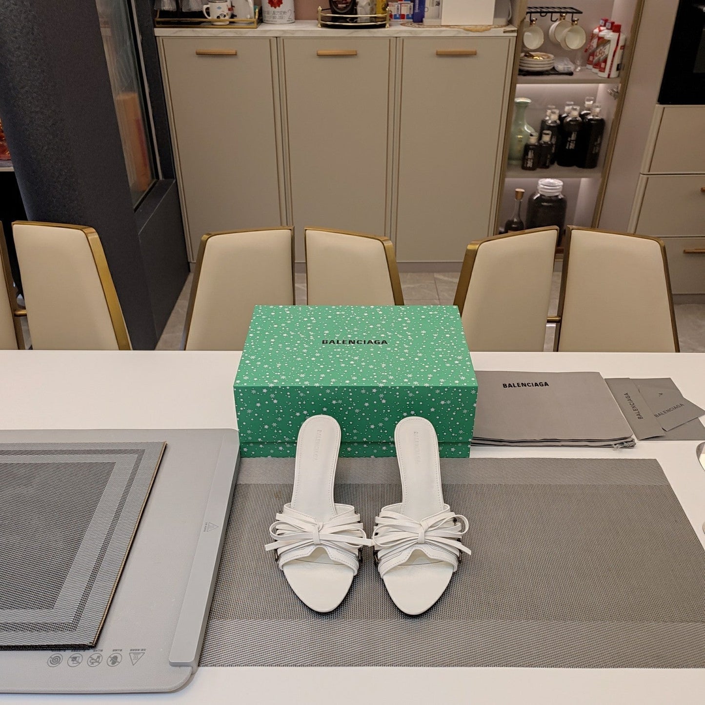 BOW-EMBELLISHED HIGH MULES IN WHITE SHEEPSKIN - 34