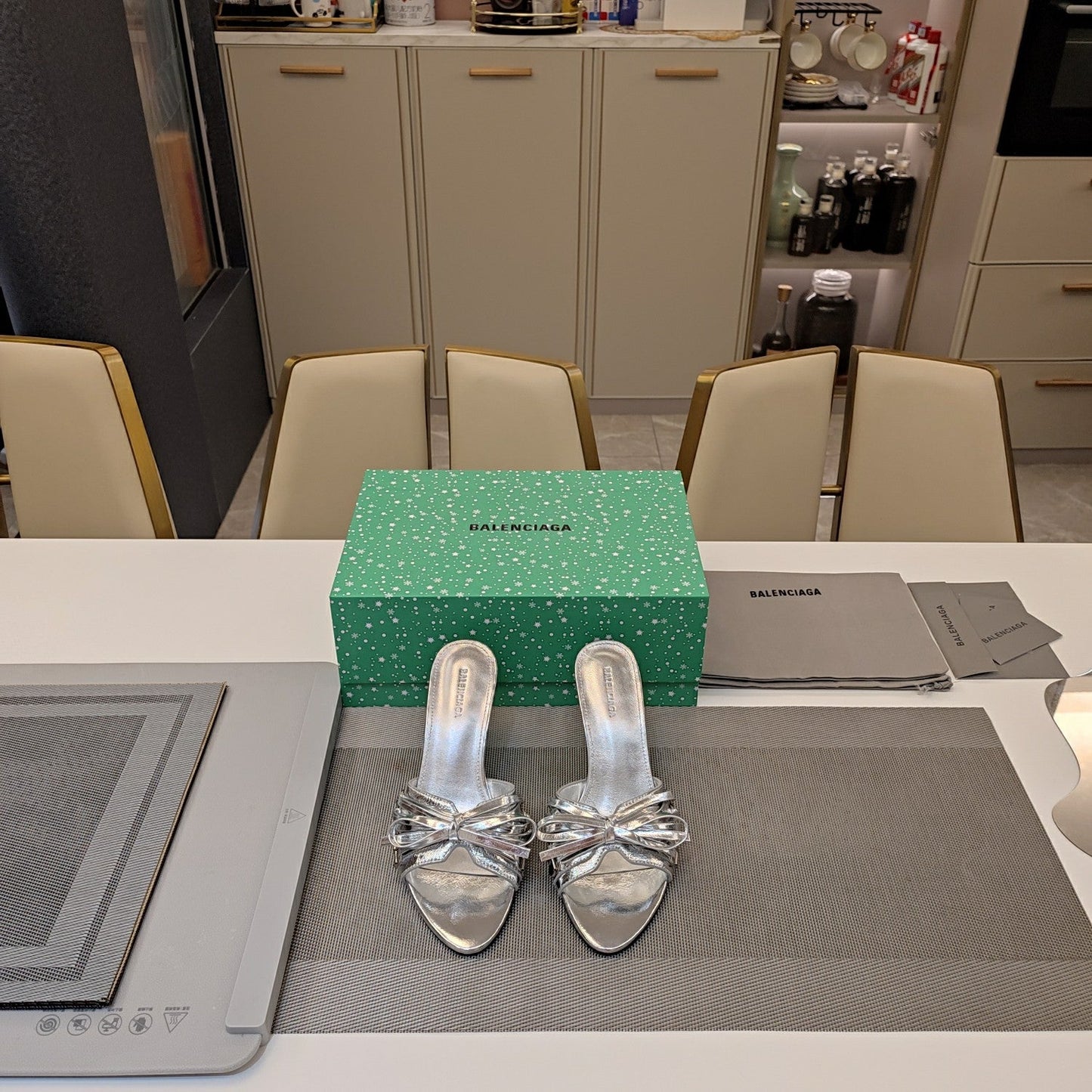 BOW-EMBELLISHED HIGH MULES IN SILVER METALLIC SHEEPSKIN - 34