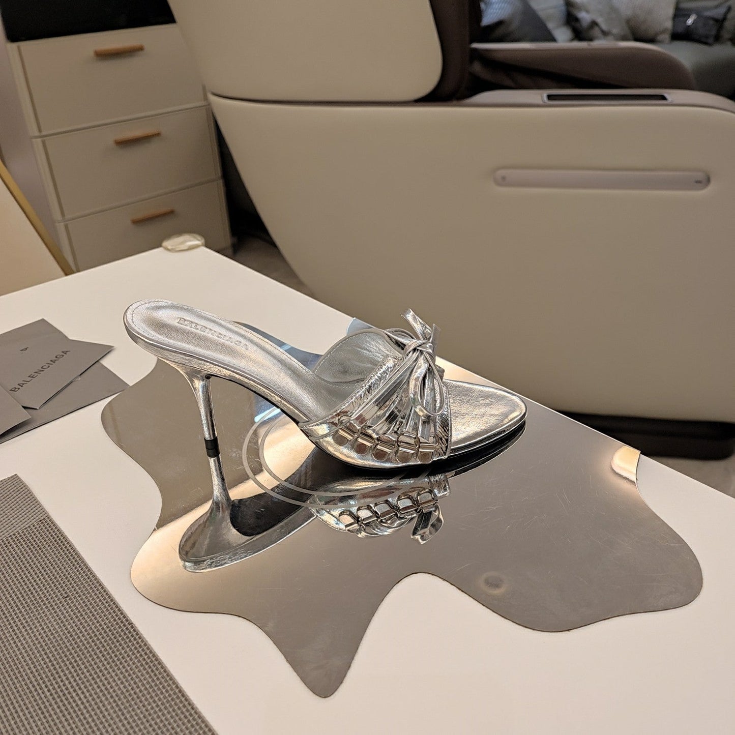 BOW-EMBELLISHED HIGH MULES IN SILVER METALLIC SHEEPSKIN - 34
