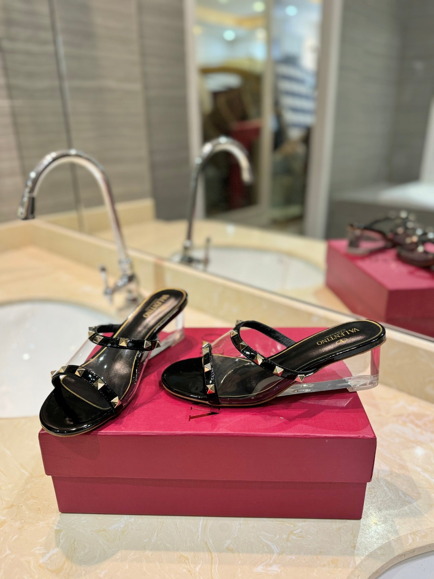 ROCKSTUD MULE SANDALS IN BLACK CALFSKIN AND TRANSPARENT PVC FILM - 34