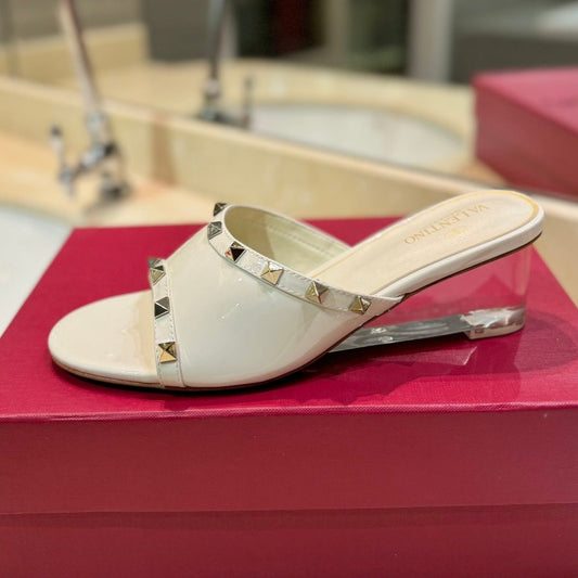 ROCKSTUD MULE SANDALS WITH TRANSPARENT HEEL IN WHITE CALFSKIN - 34