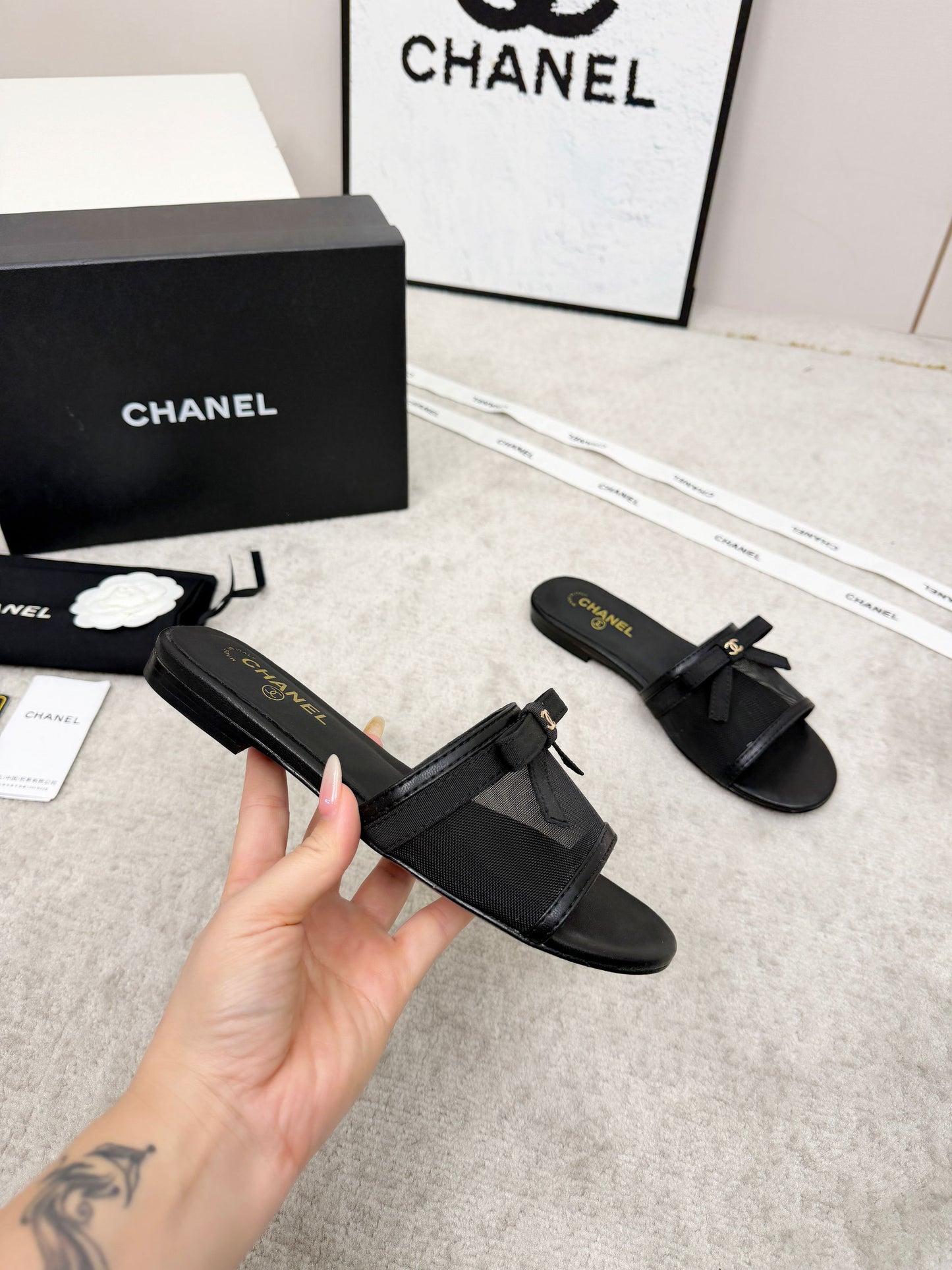 CHANEL 26S SLIDE SANDALS IN BLACK MESH AND CALFSKIN WITH RIBBON
