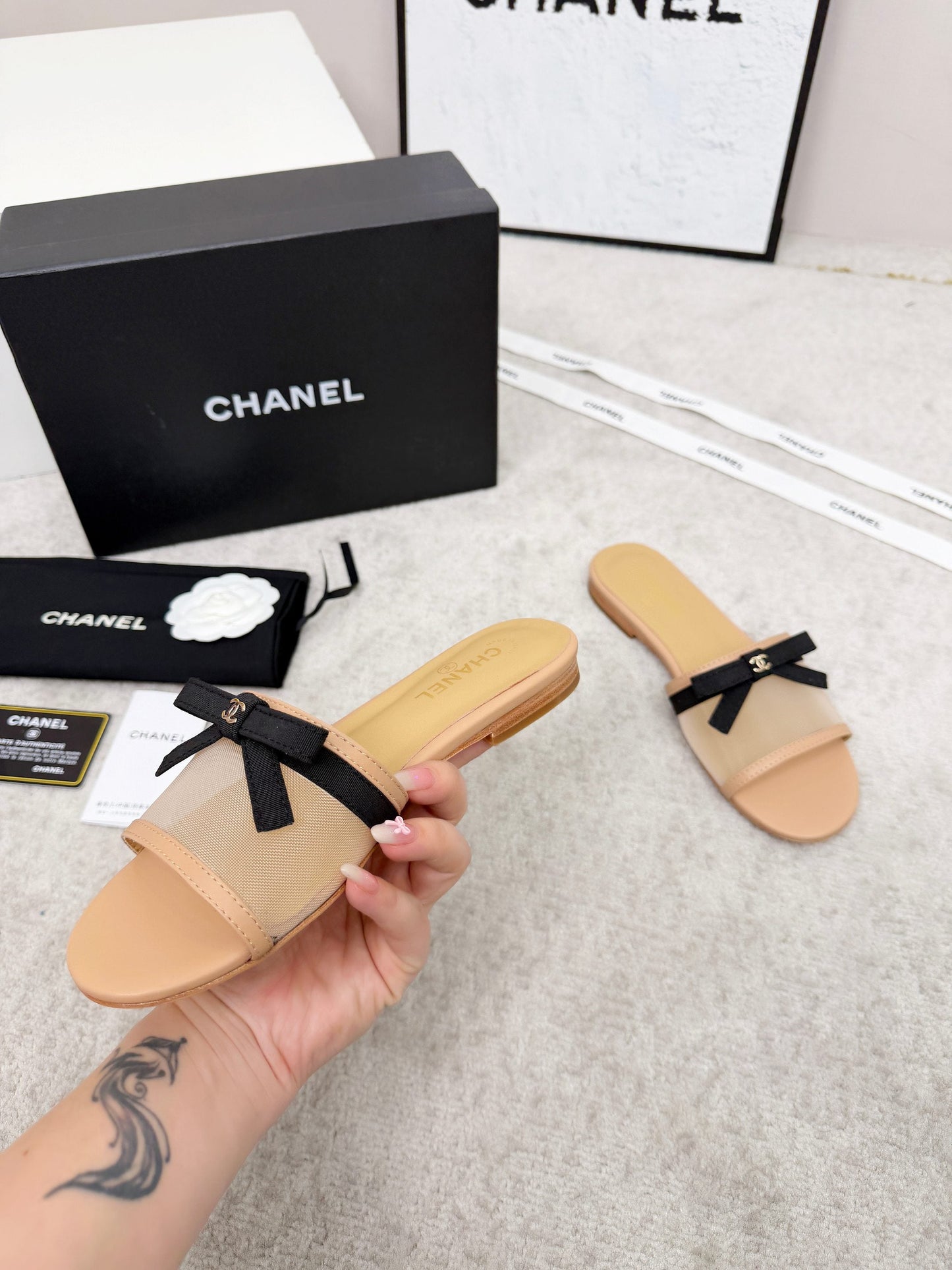 CHANEL 26S SLIDE SANDALS IN BEIGE MESH AND CALFSKIN WITH BLACK RIBBON