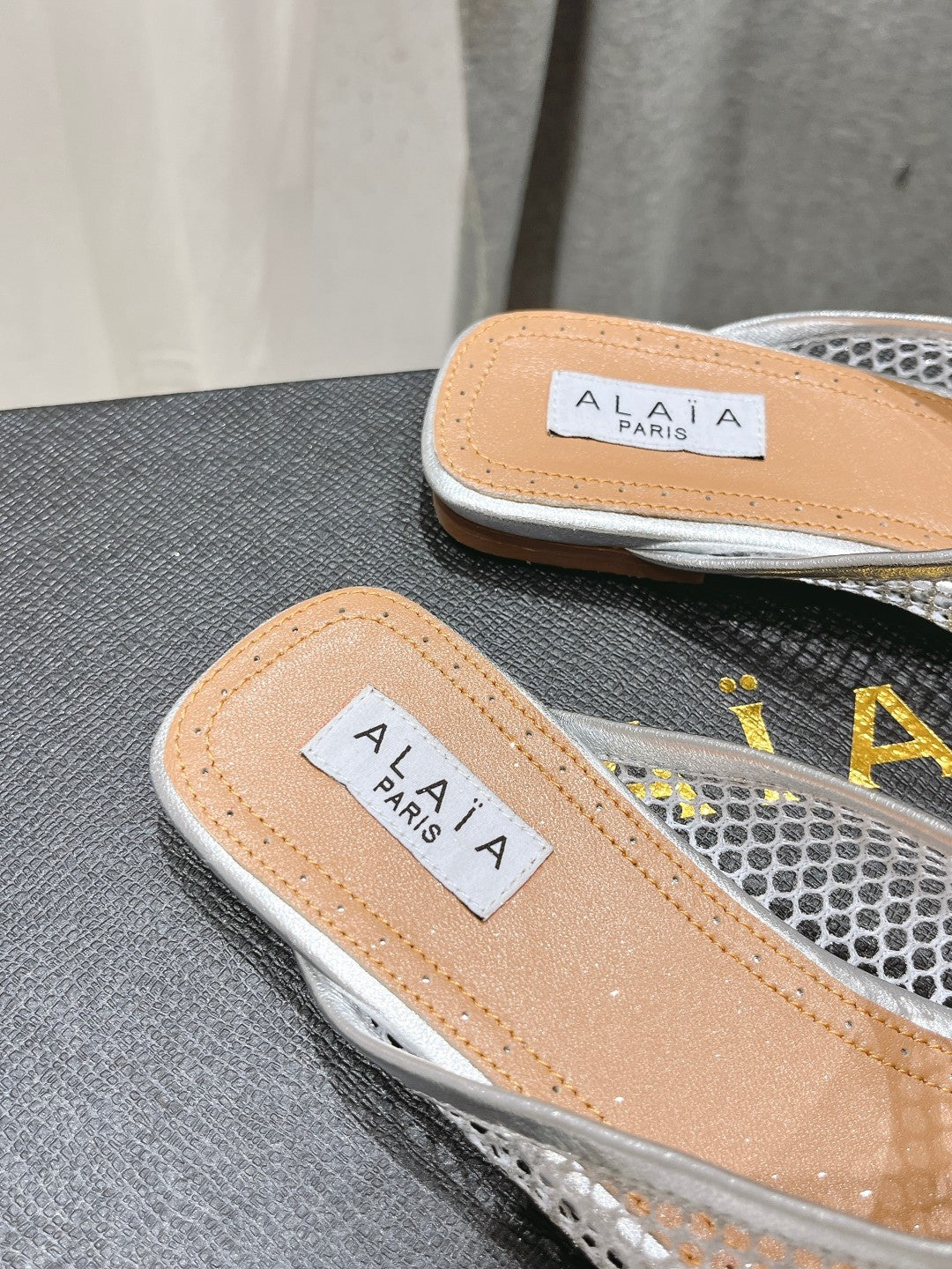 ALAIA FLAT MULES IN SILVER MESH FISHNET - 34