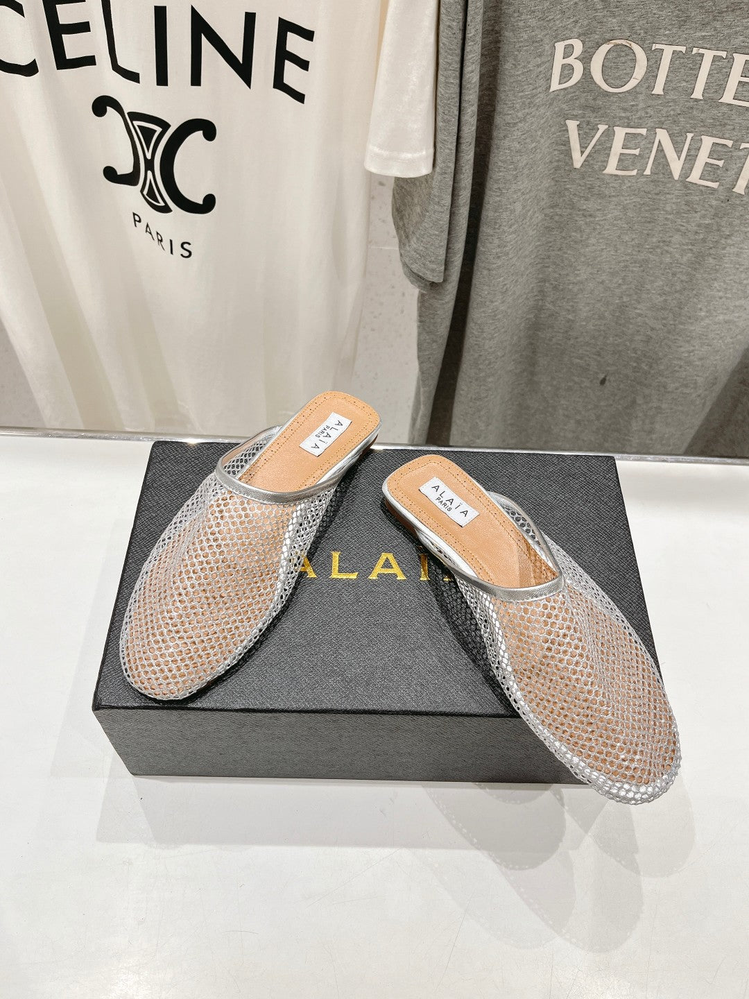 ALAIA FLAT MULES IN SILVER MESH FISHNET - 34
