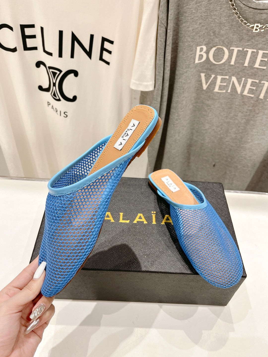 ALAIA FLAT MULES IN CERULEAN BLUE MESH FISHNET - 34