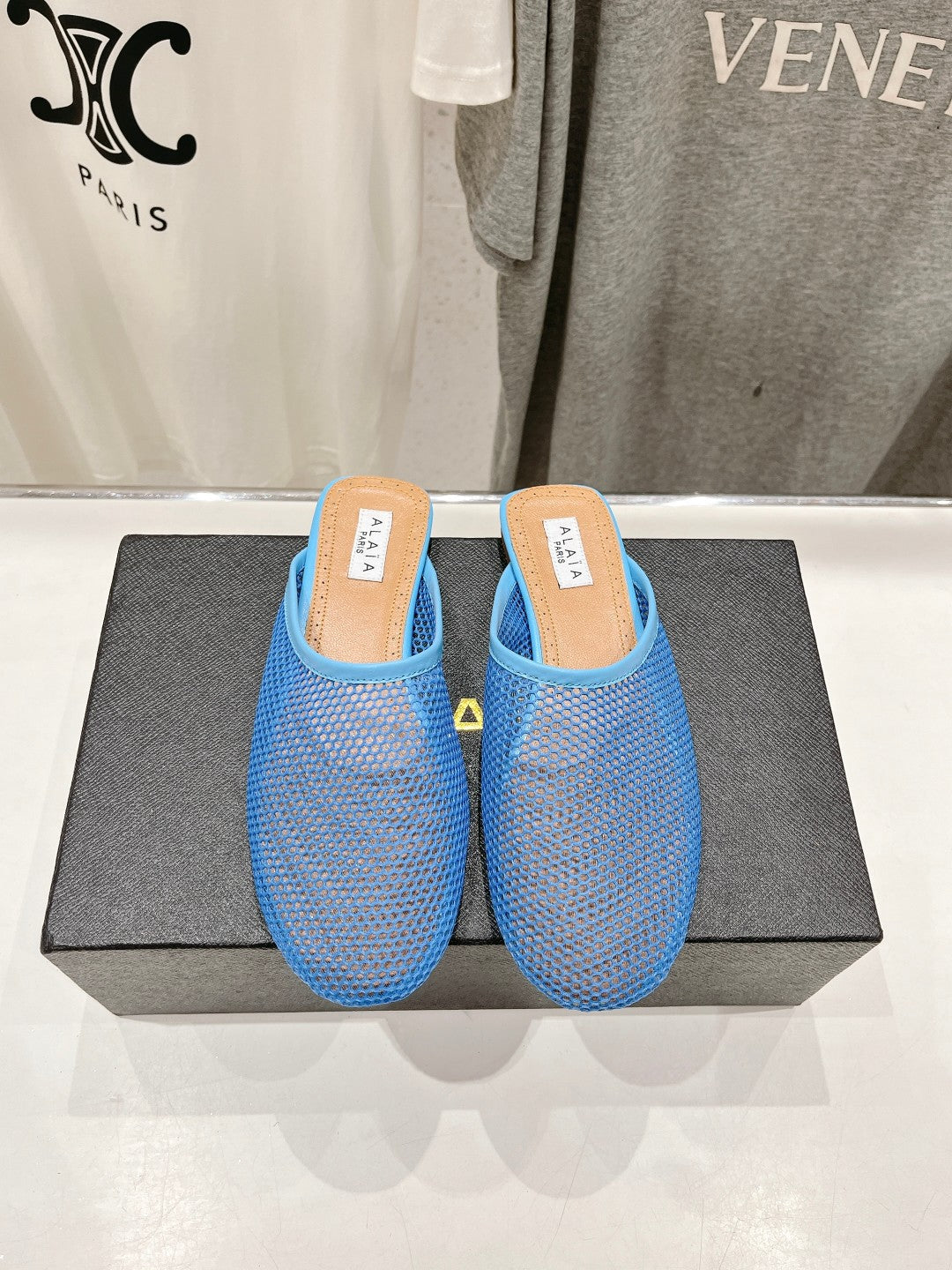 ALAIA FLAT MULES IN CERULEAN BLUE MESH FISHNET - 34