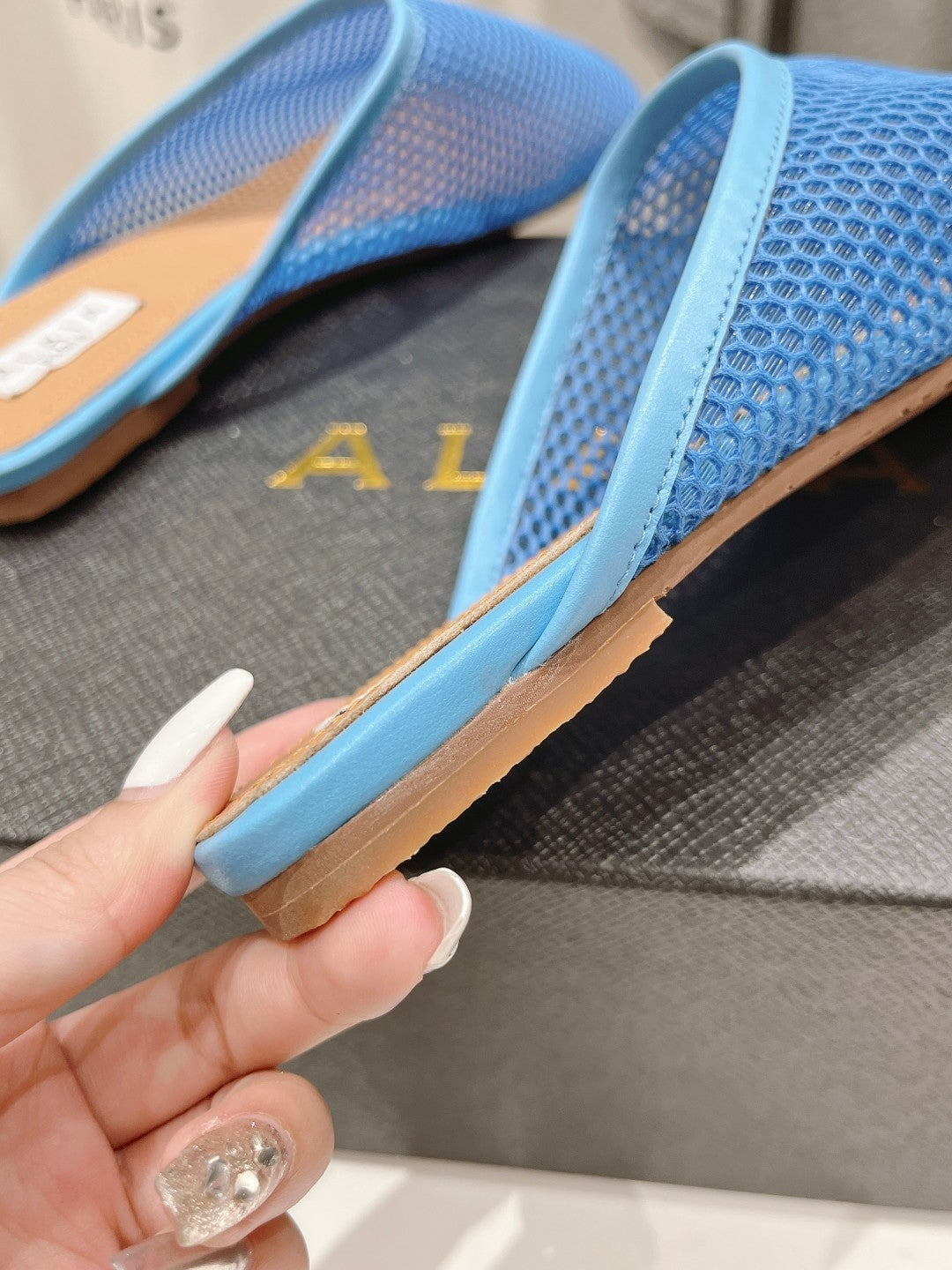 ALAIA FLAT MULES IN CERULEAN BLUE MESH FISHNET - 34