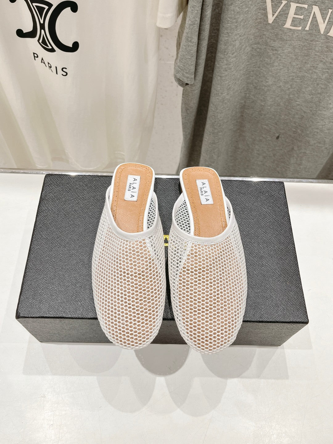 ALAIA FLAT MULES IN WHITE MESH FISHNET - 34