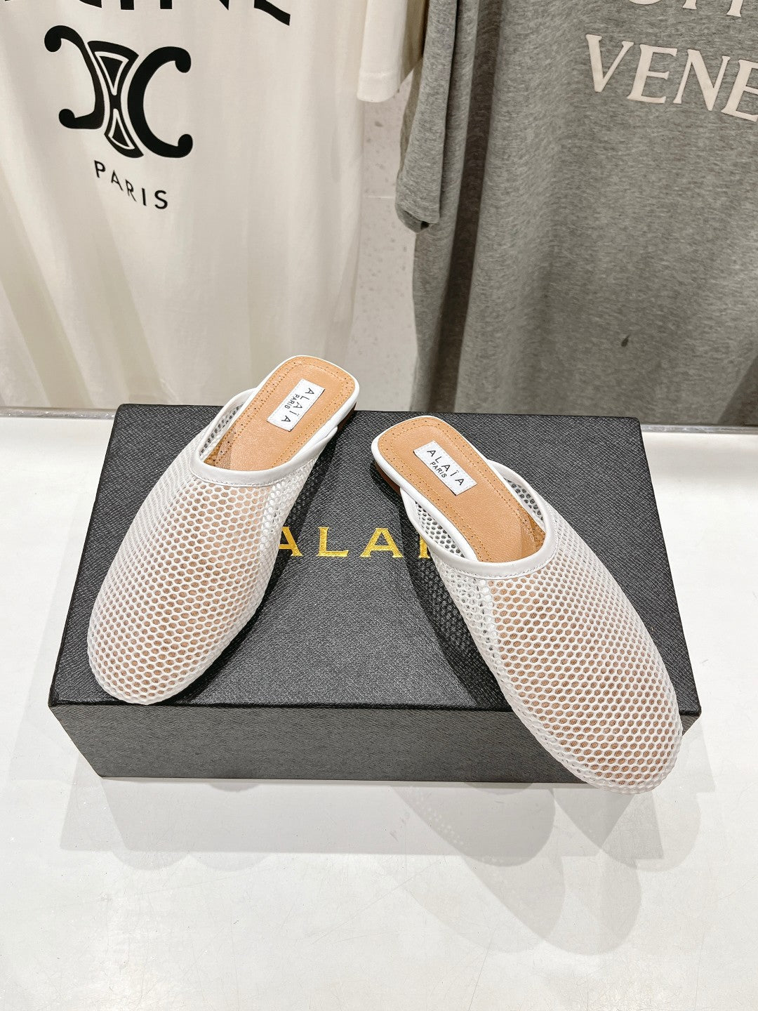 ALAIA FLAT MULES IN WHITE MESH FISHNET - 34