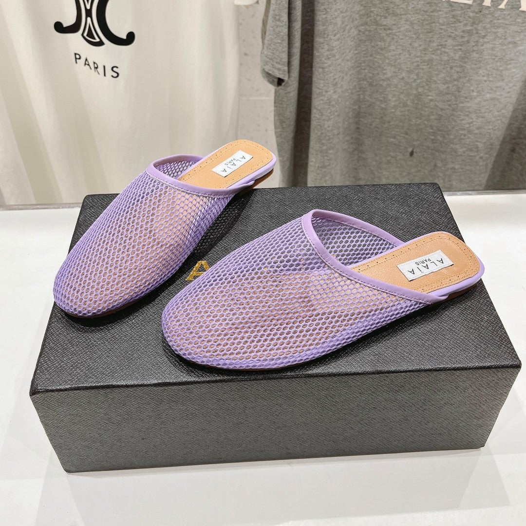 ALAIA FLAT MULES IN LIGHT PURPLE MESH FISHNET - 34