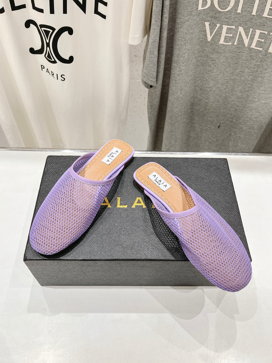 ALAIA FLAT MULES IN LIGHT PURPLE MESH FISHNET - 34