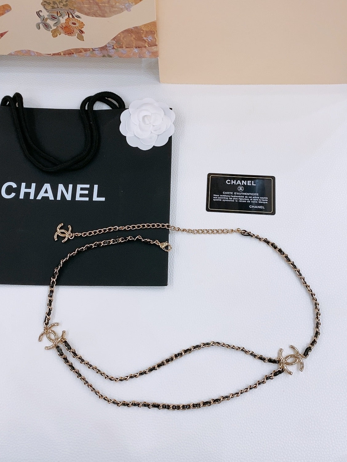 CHAIN BELT IN GOLD METAL INTERWOVEN WITH CALFSKIN STRAPS - 30