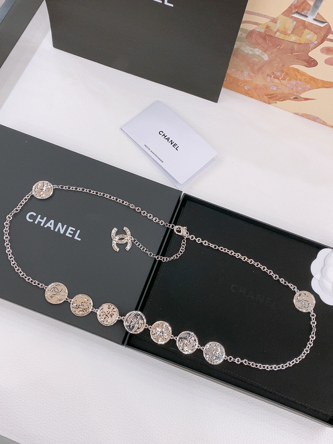 TWISTED CHAIN BELT WITH RHINESTONES AND LOGO PLATE IN SILVER TONE - 30