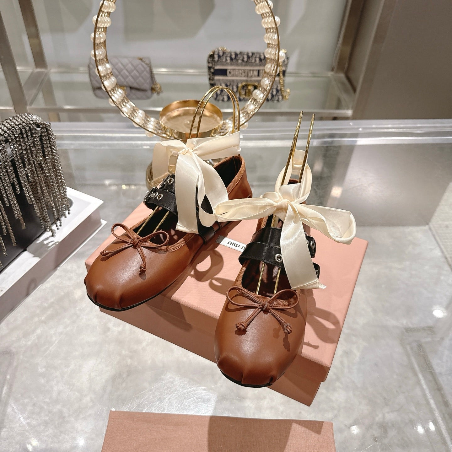 MIUMIU 26S SLINGBACK BALLET FLATS IN CARAMEL BROWN CALFSKIN AND BLACK STRAP RIBBON