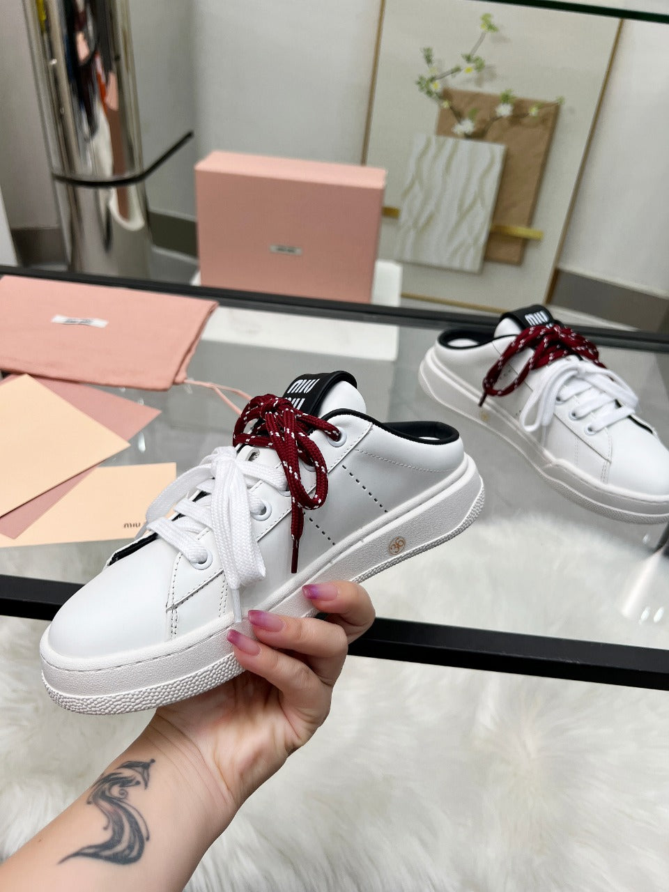SNEAKER MULES IN BLACK AND WHITE CALFSKIN WHITE RED LACES - 35